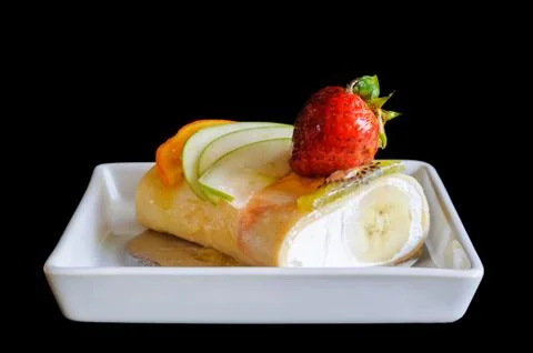 Crape cake roll with fruit Stock Photos
