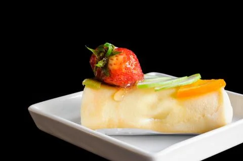 Crape cake roll with fruit Stock Photos