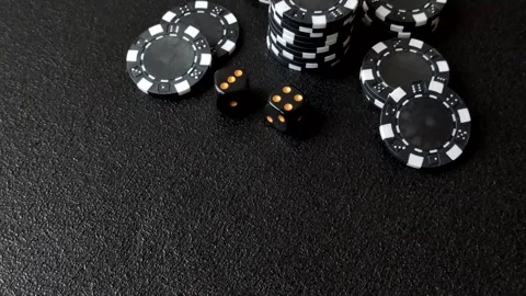 Craps is a casino game played with two dice and chips. Craps with two dice Stock Footage 332988963