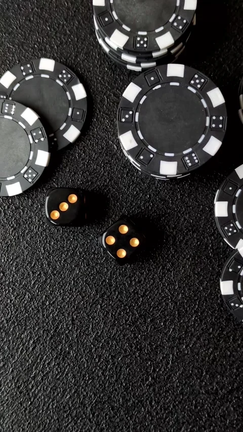 Craps is a casino game played with two dice and chips. Craps with two dice Stock Footage 332988980