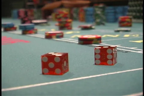 Craps dice are pulled away Stock Footage 109010