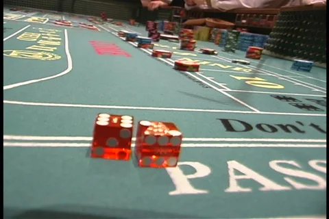 Craps dice are pulled away for roll Stock Footage 109012