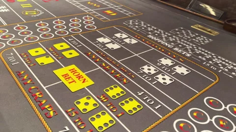 Craps Table on Cruise Ship Casino Floor for Gambling and Betting with dice Stock Footage 311453013