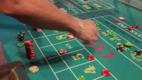 Craps Table- Hands moving chips Stock Footage 314412631