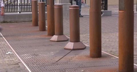 Crash- and attack-resistant bollards move back and forth Stock Footage 79438766