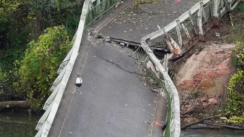 Crash of metal bridge beetween two shores . Stock Footage 120424886