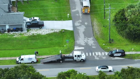Crash site with emergency services responding to accident on American street Stock Footage 308406758