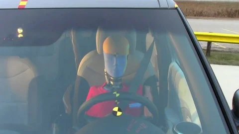 A crash test dummy experiences a side impact collision. Stock Footage 74797274