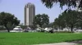 Crash Wreckage Of A Small Plane On Grass Field Next To Marina And Skyline 4K. 4k or 4k+ Resolution