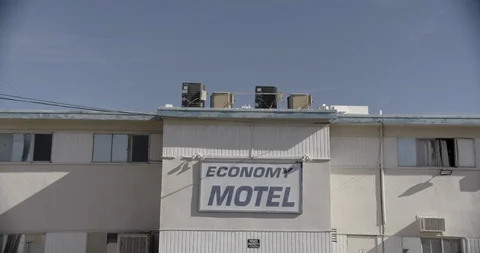 Crash Zoom Out to Low Budget Motel Stock Footage 89942685