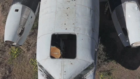 Crashed abandoned plane wreck in remote rural landscape Stock Footage 344517063