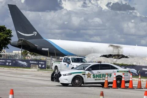 Crashed Amazon Prime Air cargo plane moved from Miami airport accident site, USA Stock Photos