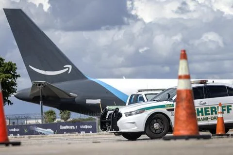 Crashed Amazon Prime Air cargo plane moved from Miami airport accident site, USA Stock Photos