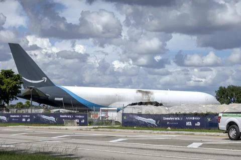 Crashed Amazon Prime Air cargo plane moved from Miami airport accident site, USA Stock Photos