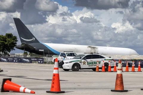 Crashed Amazon Prime Air cargo plane moved from Miami airport accident site, USA Stock Photos
