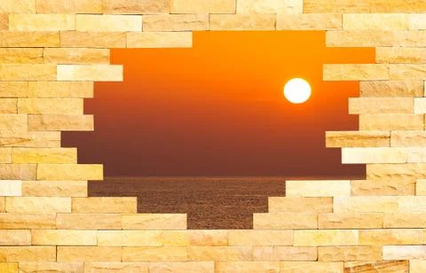 Crashed brick wall with beautiful sun set over the sea behind Stock Illustration
