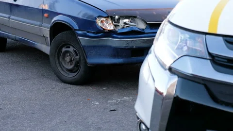 Crashed car with broken headlight 스톡 동영상 89787543