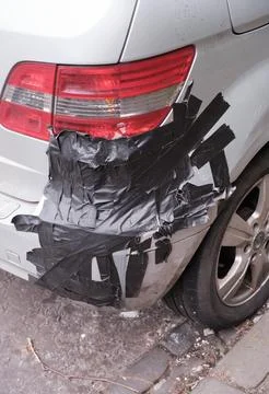 Crashed Car Fixed WIth Duct Tape Stock-Fotos