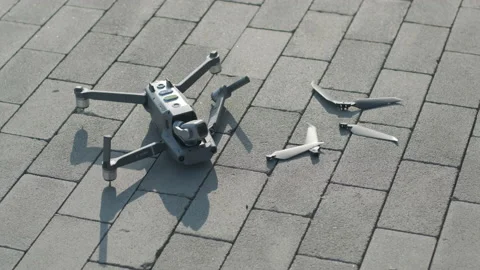 Crashed drone lays on the ground and damaged Video stock 170291215