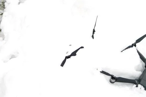 Crashed drone on snow Foto stock