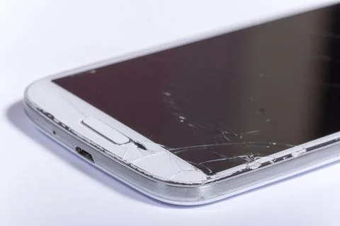 Crashed lcd touch screen on the white mobile phone Stock Photos
