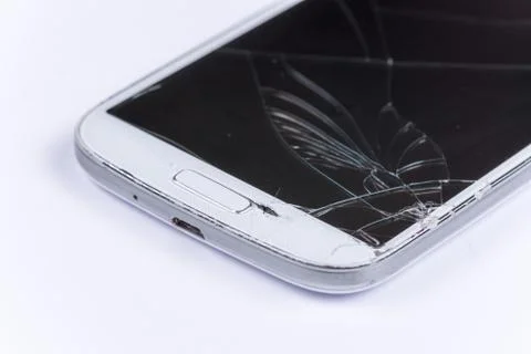 Crashed lcd on the white mobile phone Stock Photos