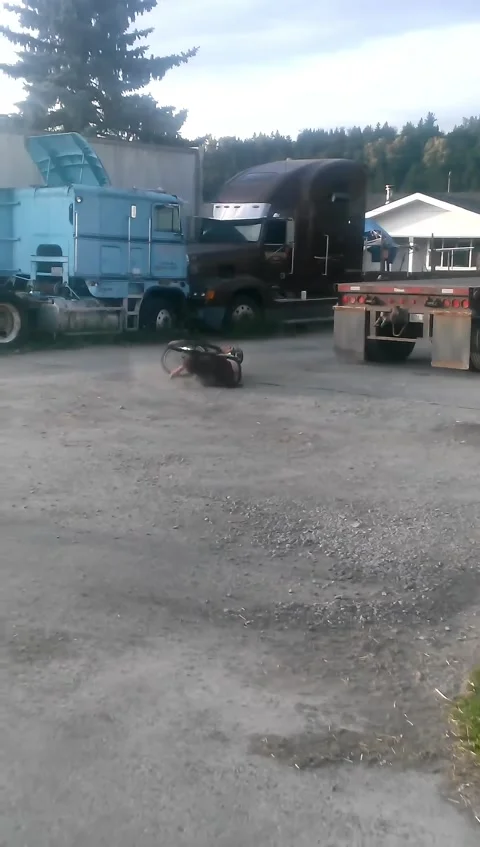Crashing a Bike Off a Flatbed Trailer, Orting, Washington, USA - 14 Dec 2016 Stock Footage 324518272