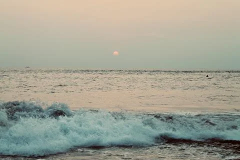Crashing Ocean Waves At Sunset Golden Hour Tanah Lot Bali Stock Photos