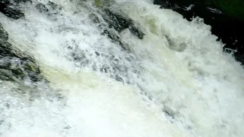 Crashing waterfall - Close Up, pounding down cliff - Slow Motion Stock Footage 244361539