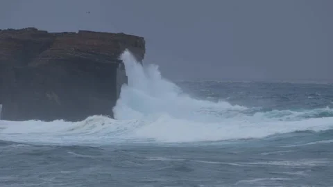 Crashing waves against the cliffs in Orkney in 4k Stock Footage 289560972