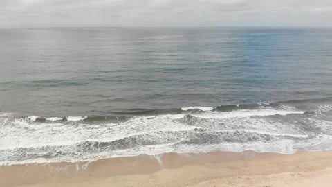 Crashing waves on the beach Stock Footage 95057356