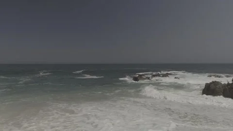 Crashing Waves Over Rocks Stock Footage 279772597