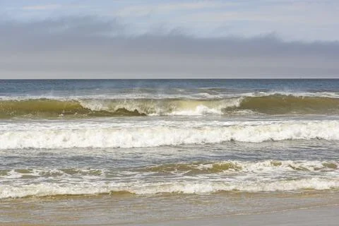 Crashing Waves on a Remote Beach Stock Photos