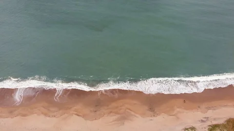 Crashing Waves &amp; Walking Couple Stock Footage 96673573