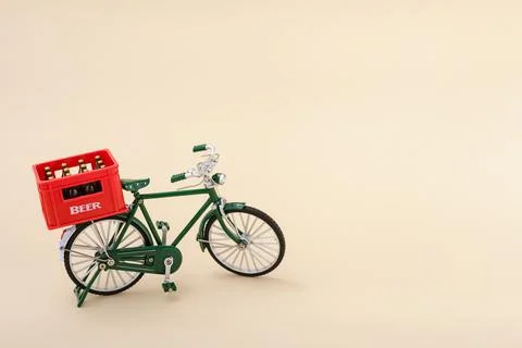 A crate of beer on a bicycle Stock Photos