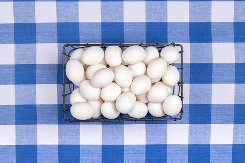 Crate of fresh eggs on tabletop Stock Photos