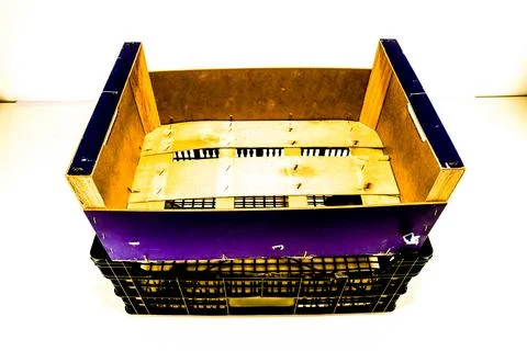 A crate is sitting on a white background Stock Photos