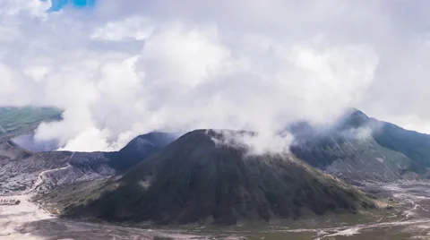 Crater of volcano Bromo in Java Indonesia. Asia travel destination background Stock Footage 64757382
