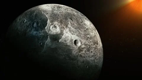 A cratered moon or planet in deep space with a bright sun flare in the corn.. Stock Footage 340383306