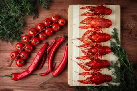 Crawfish on a chopping Board Stock Photos