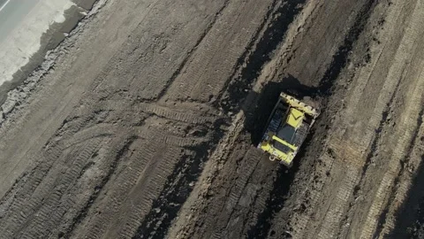 Crawler excavator front view digging on construction site 스톡 동영상 156885224