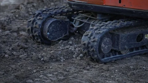 Crawler excavator moves on the surface of loose soil. Stock Footage 201270734