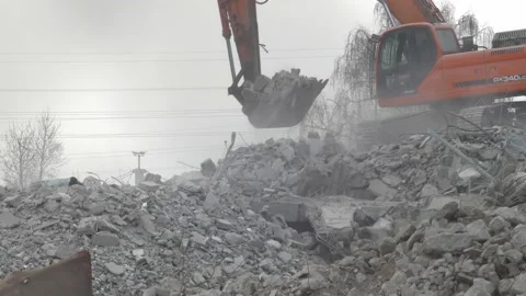 Crawler Excavator Working on Building Demolition Construction Site Slow Motion Stock Footage 130989883