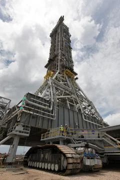 Crawler-transporter 2 (CT-2) is being moved under the mobile launcher May 3.. Photos