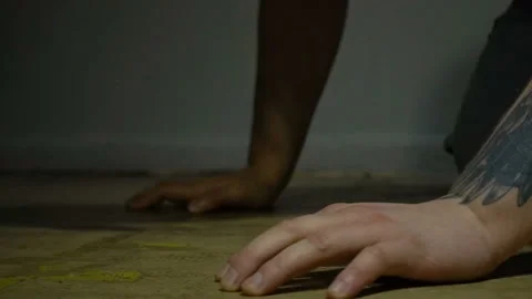 Crawling prisoner bound in chains Stock Footage 95751483