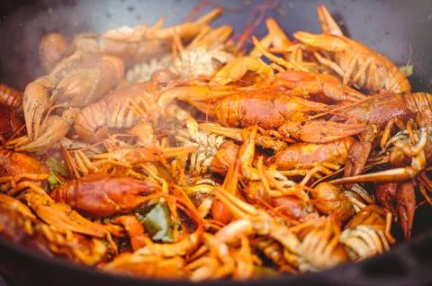 Crayfish are boiled in cauldron is steam Stock Photos