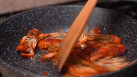 Crayfish fried in a frying pan Stock Footage 254685114