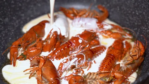 Crayfish fried in a frying pan Stock Footage 254685857