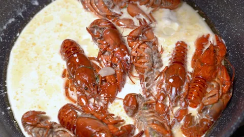 Crayfish fried in a frying pan Stock Footage 254686384