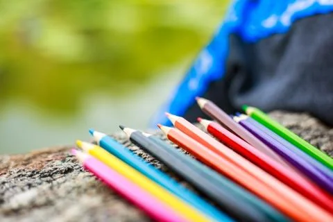 The crayon are on the ground. Stock Photos
